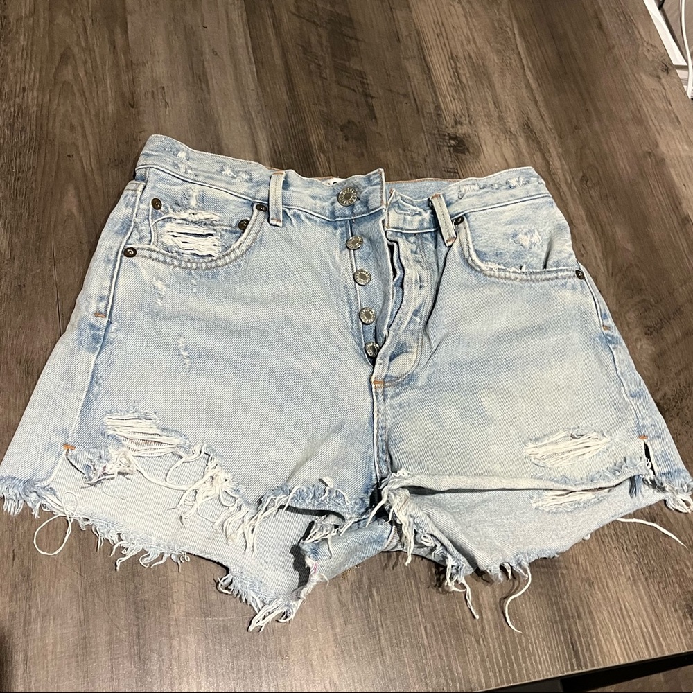 Agolde distressed light wash denim shorts